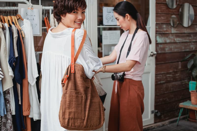 Boutique owner submitting a handbag photo on Find My Bag for on-demand sourcing